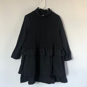 Avant-garde dress. Think Moria Rose from Shits Creek!